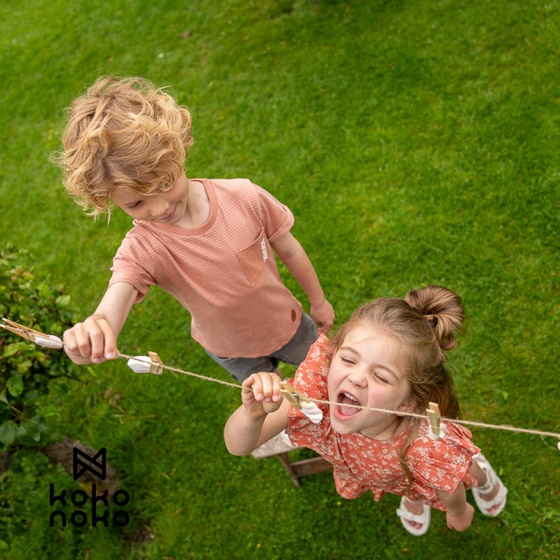 裾ラウンド ボーダー半袖Tシャツ ワッペン ポケット付き